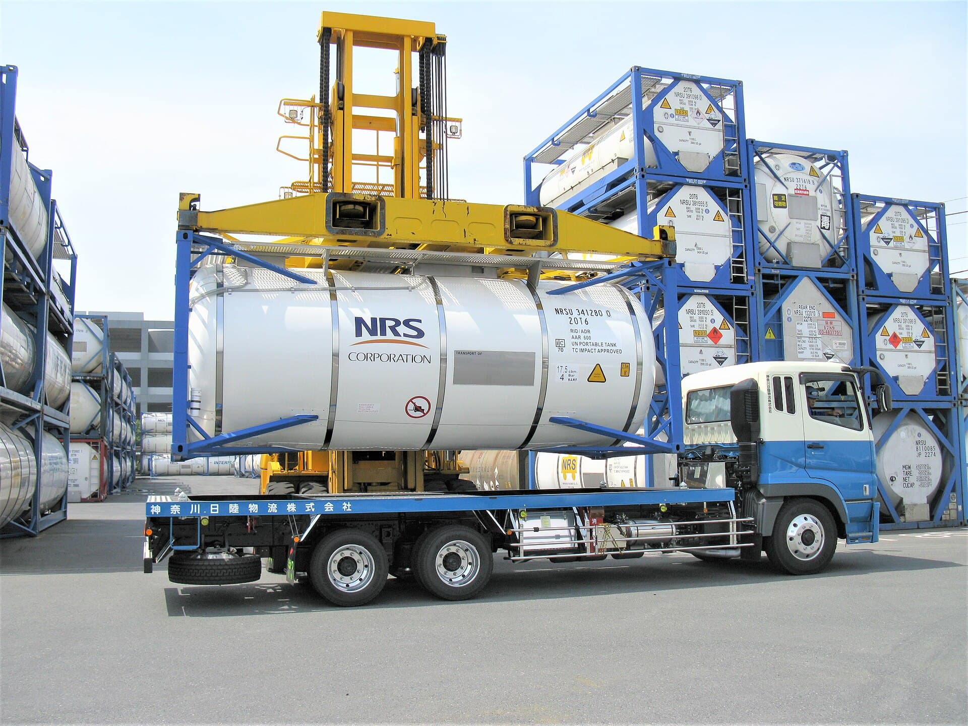 An ISO tank container — a cylindrical tank inside a standard container frame.