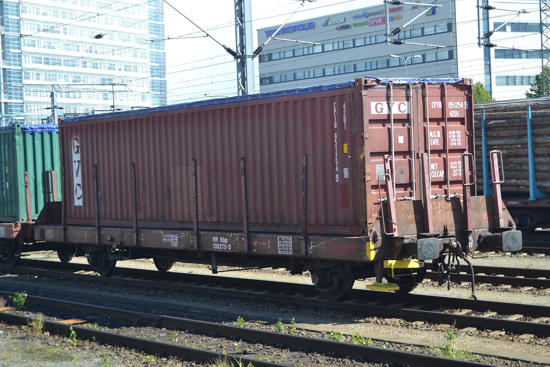 An open-top container, loaded from above for tall or bulk cargo.