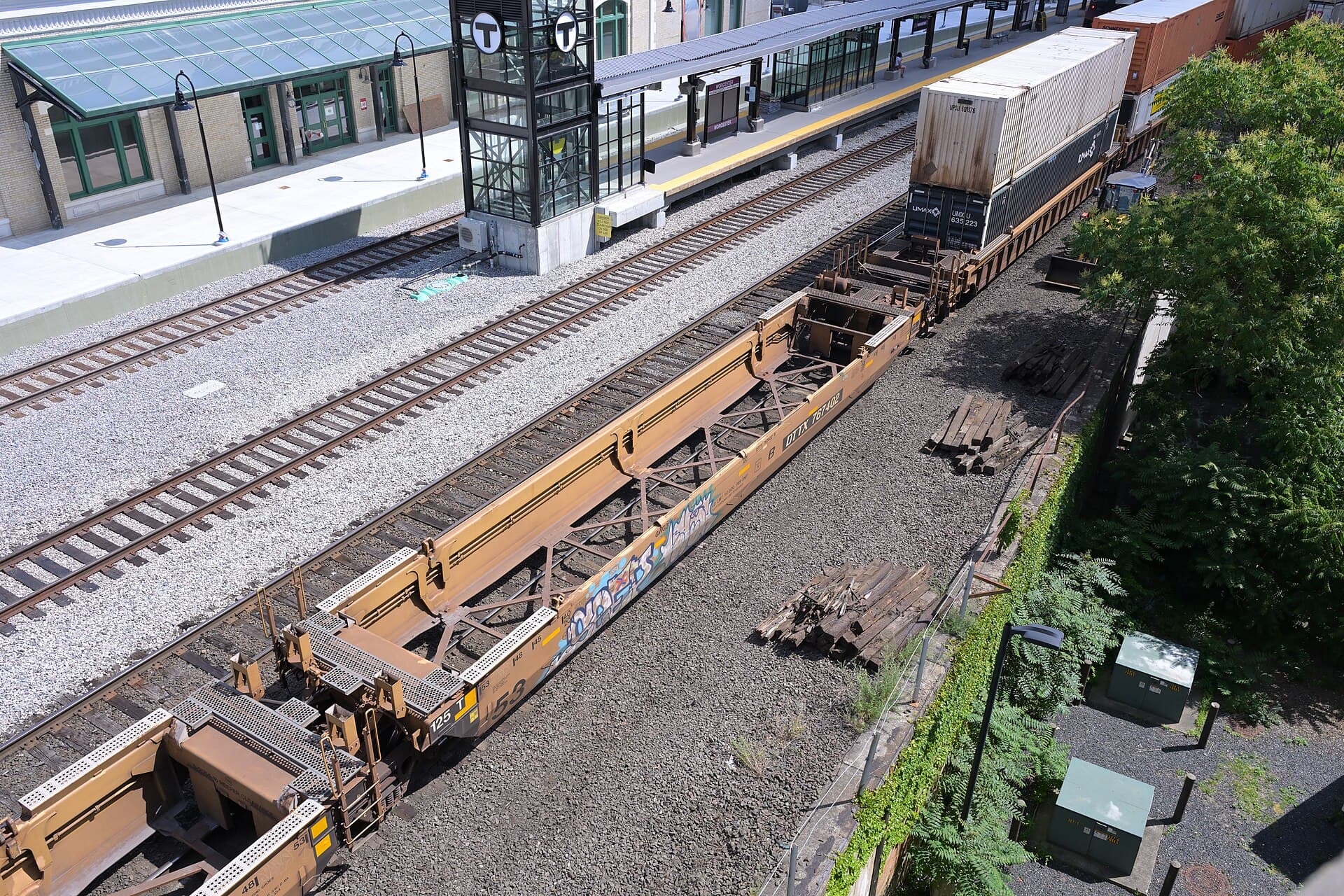 An empty double-stack well car, showing the central well that lets a container ride low.